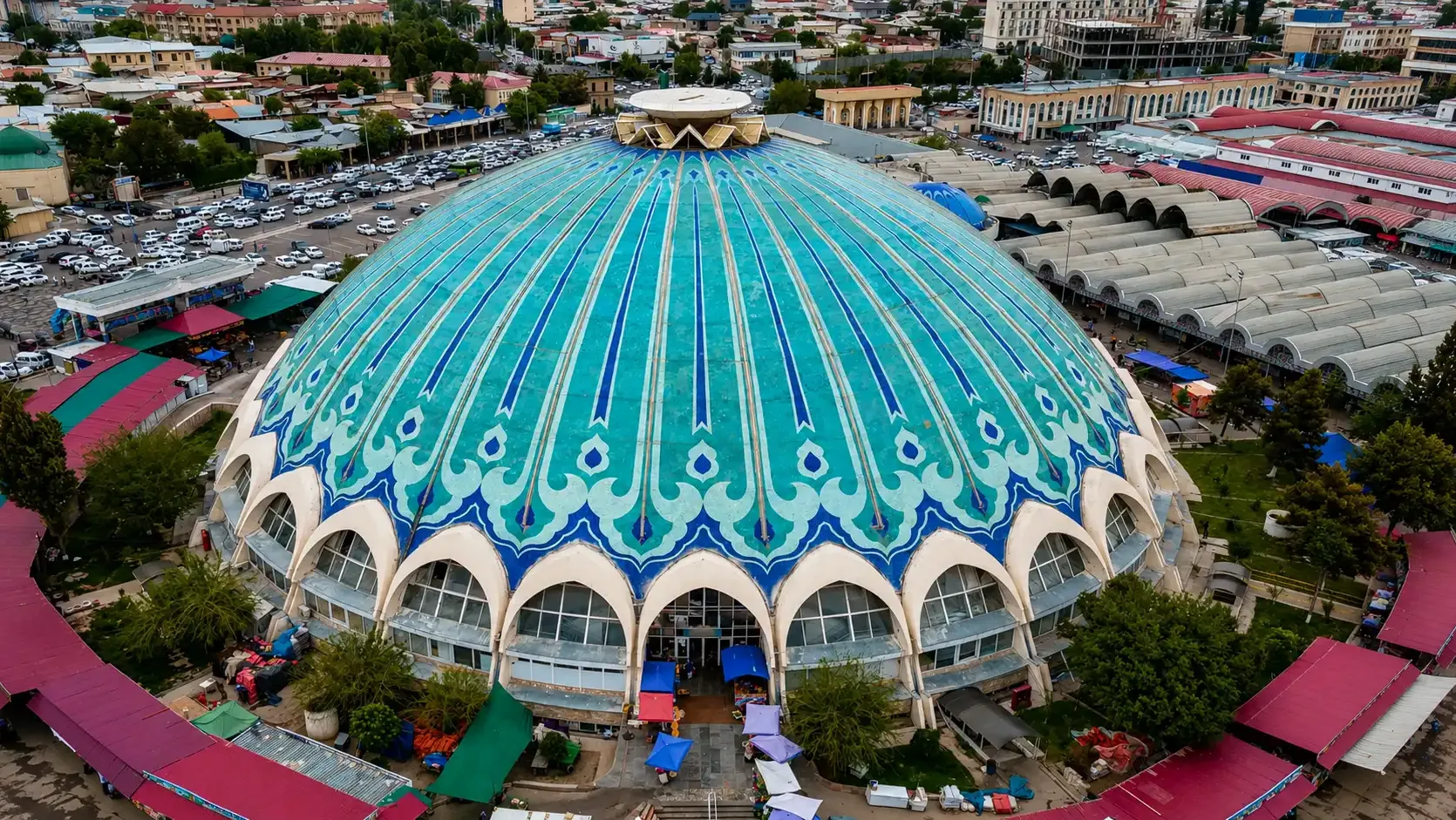 The turquoise dome of Chorsu bazaar above the market rows of old Tashkent.